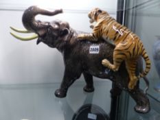 A Beswick pottery figure of an elephant and a tiger. 31cm high