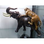 A Beswick pottery figure of an elephant and a tiger. 31cm high