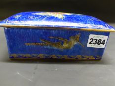 Daisy Makeig-Jones: A Wedgwood humming bird lustre lidded rectangular box. 25294X. 17cm x 10.5cm