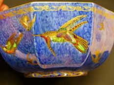 Daisy Makeig-Jones: A Wedgwood octagonal lustre bowl with orange lustre interior, mottled blue