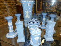 A group of Wedgwood blue Jasper ware pieces to include a large tapered square form vase, three pairs
