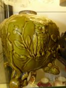 A Wedgwood green glazed pottery square form lamp base decorated with owls and bats. 18cm high