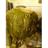 A Wedgwood green glazed pottery square form lamp base decorated with owls and bats. 18cm high
