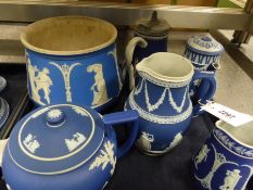 A group of blue Jasper ware to include jardiniere, jugs, vases, etc.