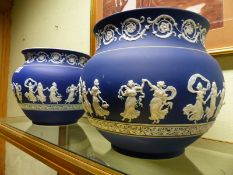 A near pair of Adams blue Jasper ware jardinieres with classical decoration. 24.5cm high