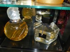 Large size perfume/ scent display bottles.Givench and Flora by Gucchi