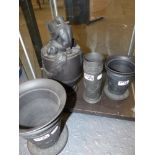 Four pieces of Wedgwood black basalt two tapered vases, a ewer with triton form handle and a