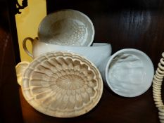 A Wedgwood pottery Bordalou, three Wedgwood jelly moulds and another similar