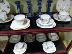 A collection of ten Shelley trios some with Art Deco designs. Each trio comprises a cup, saucer