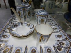 Two Wedgwood morning tea seat, one with blue and gilt neo classical style decoration, the other pink