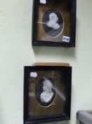 A pair of Wedgwood oval black Jasper ware portrait plaques of David Garrick and Sarah Siddons.