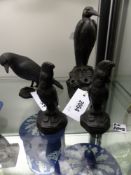 Four Wedgwood black basalt figures of birds, a heron 19cm high a crow and two cockatoos