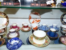 A collection of various antique and later Wedgwood cabinet cups and saucers