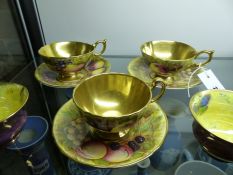 Three Aynsley fruit decorated cabinet cups and saucers together with a pair of insect decorated