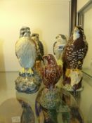 Five Beswick pottery Scotch whisky bottles in the form of birds of prey