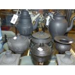 A group of antique and other black basalt wares some by Wedgwood to include two coffee pots, pair of