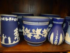 A collection of Jasper ware jugs, jardinieres etc. in various colours