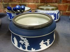 Three blue and white Jasper ware deep bowls with silvered rims and two pairs of servers.