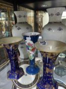 A pair of Wedgwood Vieux Roven pattern tall cases. 38cm high together with a pair of Crown Ducal
