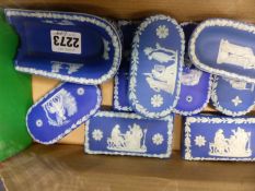 A group of Wedgwood blue Jasper ware small boxes and covers, pin trays, etc.