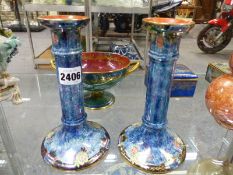 A pair of Grimwades lustre candlesticks. 19cm high. A pair of double gourd shaped lustre vases. 23cm