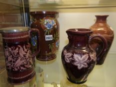 Four pieces of 19th/20th Century brown glazed pottery, a cylinder form lamp base, a studio vase