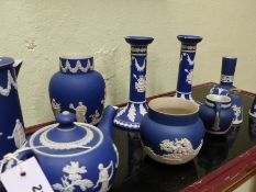 A small collection of Adams blue Jasper ware to include a pair of candlesticks, a teapot, a
