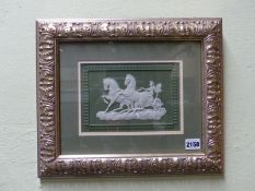 A framed Wedgwood green Jasper ware rectangular plaque of a classical charioteer. 14.5 x 21cm