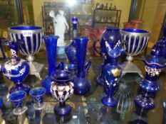 A pair of cobalt blue glass metal mounted vases of neo classical style and various other decorated