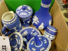 A group of Wedgwood blue Jasper ware small articles to include three ring stands, covered boxes, a