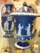 A pair of Wedgwood blue Jasper ware classical Amphora twin handle vases. 24.5cm high together with a