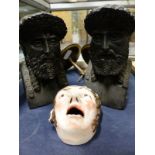 An unusual mask form antique inkwell with polychrome decoration together with a pair of classical