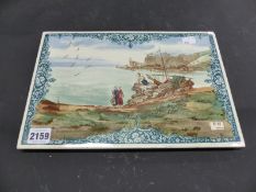 A French pottery landscape plaque of a coastal scene. Signed H.H. Depose. 21.5 x 32.5cm