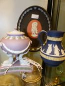 Three pieces of Wedgwood three colour Jasper ware, a lilac and green dolphin base censer with