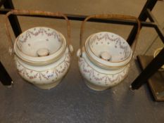 A pair of English Crescent ware large pails with wicker swing handles, conforming pierced lids