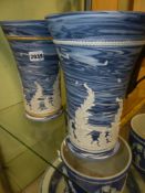 Two unusual Wedgwood marbled pottery tall vases, with leaf and insect raised decoration. 25cm high