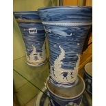 Two unusual Wedgwood marbled pottery tall vases, with leaf and insect raised decoration. 25cm high