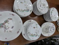 A 19th.c.French porcelain part dinner service decorated in the famille vert palette after the