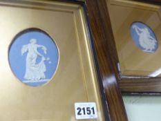 A pair of blue Jasper ware oval plaques of classical muses. Framed. 10cm high