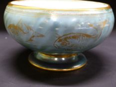 Daisy Makeig-Jones: A Wedgwood small turquoise lustre bowl with gilded fish designs. 12cm diameter x