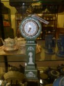 A green Wedgwood vintage miniature Jasper ware tall case clock with gilt bronze mounts. 35cm high