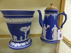 A Wedgwood blue Jasper ware coffee pot with plated lid 25cm high together with a flared form vase.