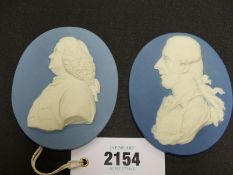 Two antique Wedgwood and Bentley blue Jasper ware oval portrait plaques. One of Benjamin Franklin