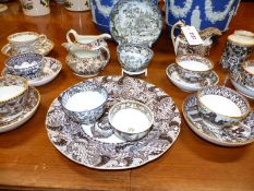 A collection of antique Staffordshire brown printed pottery tea wares to include bowls, cups,