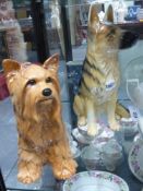 Two Beswick pottery figures of dogs, a Scotch terrier and a German shepherd. height of largest 35cm