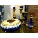 Six pieces of Doulton glazed stoneware, a pair of miniature vases, a pair of candlesticks. 16cm high