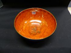 Daisy Makeig-Jones: A Wedgeood lustre bowl with orange interior, mottled blue exterior with