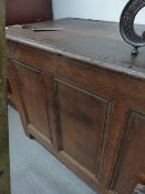 AN EXTREMELY LARGE EARLY 18TH.C.PLANK TOP FIVE PANEL FRONT COFFER.