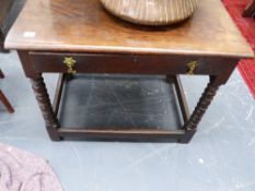 AN 18TH.C.OAK SIDE TABLE ON BOBBIN SUPPORTS UNITED BY STRETCHER.
