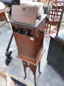 A RARE VICTORIAN STEREOSCOPIC VIEWER IN MAHOGANY AND EBONISED CASE WITH ROTATING RACK FOR MULTIPLE